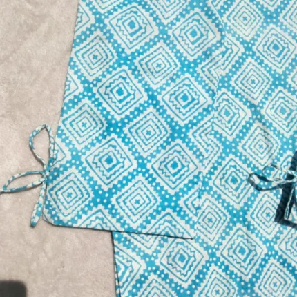 Teal and white women's two-piece suit by SHEEFON Closet