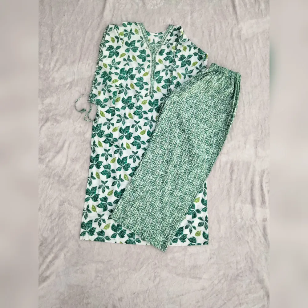 WhatsApp Image 2026-09-06 at 6.40 Green and white long kurti two-piece outfit by SHEEFON Closet